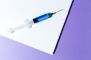 Covid-19- Vaccine vial dose against coronavirus needle syringe, medical concept vaccination