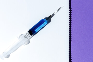 Covid-19- Vaccine vial dose against coronavirus needle syringe, medical concept vaccination