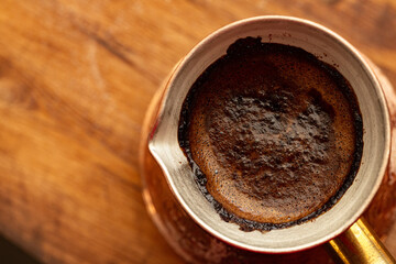 Turkish coffee with foam in copper turk