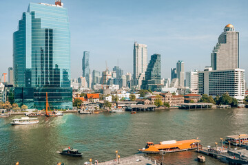 Bangkok cityscape with business skyscrapers at Chaopraya river