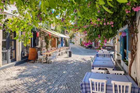 Fototapeta Picturesque street in Mediterranean Alacati Town in Turkey.