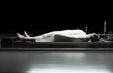 cadaver, dead male body in morgue on steel table. Corpse. Autopsy concept. 3d rendering.