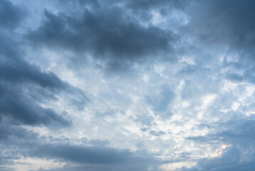 Cloudy skies parting after a storm