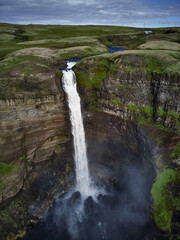 Haifoss waterfall in the highlands of Iceland, Aerial view. Dramatic landscape of Waterfall in Landmannalaugar canyon