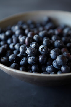 Blueberries in Bowl with Water Droplets Detail