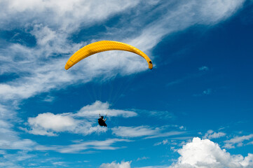 Paraglide in a blue sky