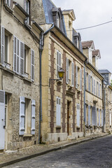 Fototapeta premium Beautiful Old Stone House in medieval city Senlis. Senlis is a commune in Oise department in northern France. 