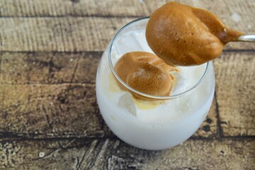 Iced Dalgona Coffee. Trend Korean Drink Creamy Whipped Iced Coffee