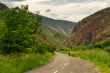 Highway in a picturesque gorge with red mountains near Noravank Monastery, Armenia