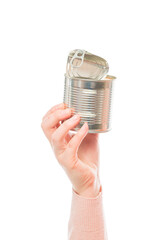 Empty tin can isolated in human hand on the white background