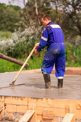 Leveling of the cement or concrete of the foundation formwork from concrete mixer