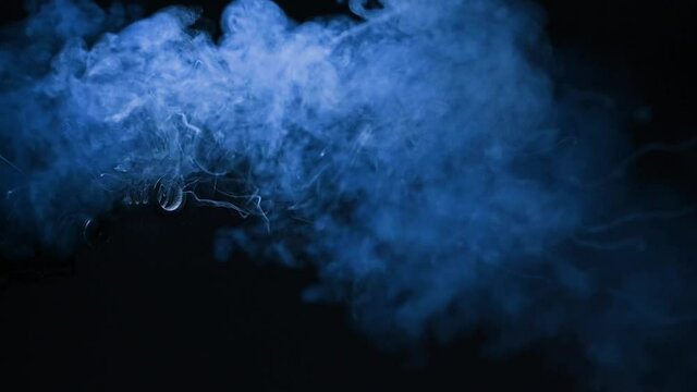 Realistic shotgun shot with smoke on black background