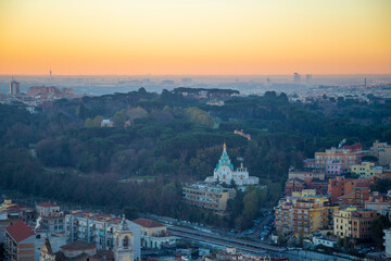 Obraz premium View of Vatican city and Rome from the dome of Saint Peter cathedral in the morning