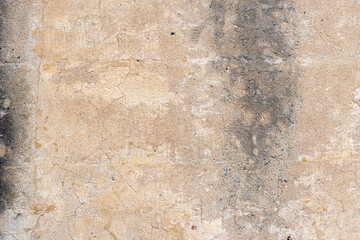 Background of a texture of an old and stained wall