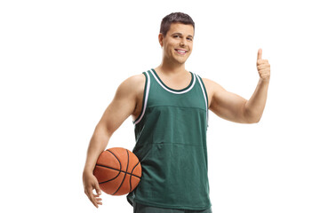 Obraz premium Basketball player in a jersey holding a ball and showing thumbs up