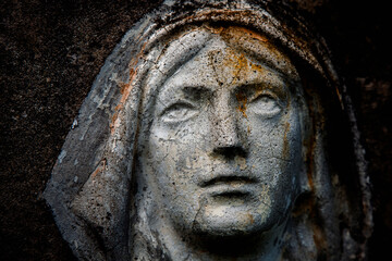 Fototapeta na wymiar Virgin Mary. Ancient statue. Religion, faith concept