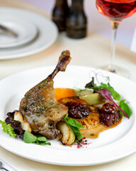 tasty chikens lies in white plate