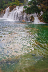 Krka National Park. Waterfall and wild landscape at famous tourist attraction in Croatia