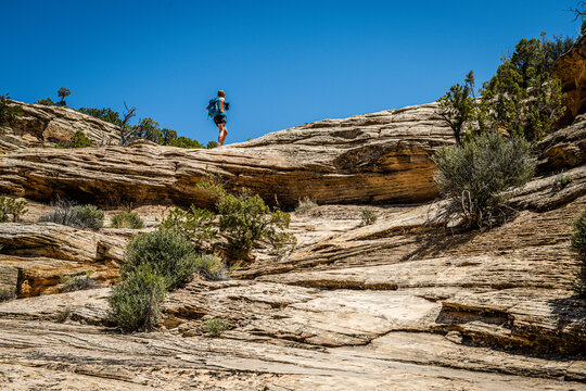 hiker on desert ridge line