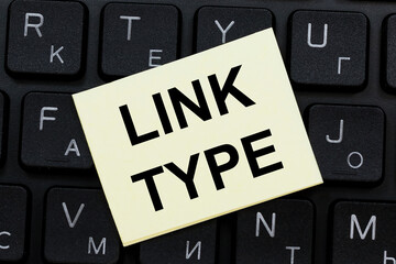 LINK TYPE word concept on sticker on the keyboard