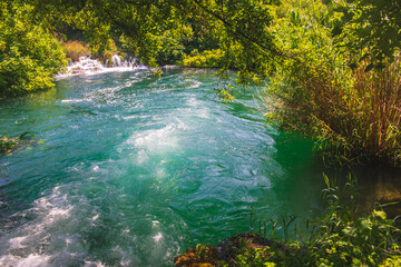 Krka National Park. Waterfall and wild landscape at famous tourist attraction in Croatia
