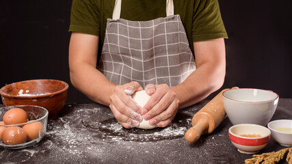 Obraz na płótnie Canvas A man is baking homemade bakery