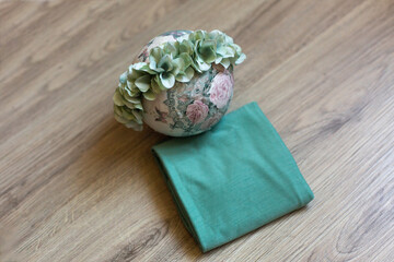 a mint-colored headband and a diaper for a little girl. props for a newborn photo shoot. winding and wreath
