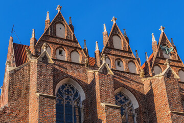 View of Collegiate Church of the Holy Cross and St. Bartholomew in Wrocław. Gothic church located...