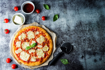 Pizza Margarita with tomato sauce and Mozzarella cheese