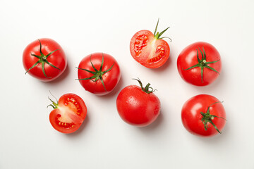 Fresh ripe tomatoes on white background, top view