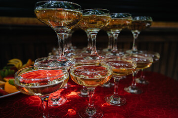 Festive glasses on the festive table during the Banquet. Alcoholic beverage