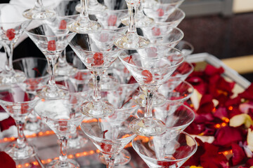 Festive glasses on the festive table during the Banquet. Alcoholic beverage