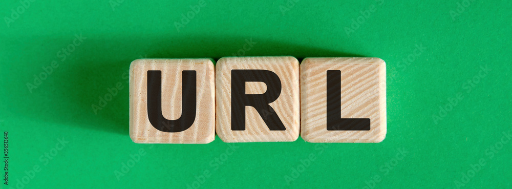 Poster url website - text on wooden cubes with green background