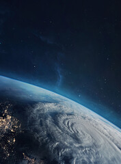 Planet Earth in space with city lights. Hurricane and clouds. Orbit of planet. VIew from space station. Elements of this image furnished by NASA.