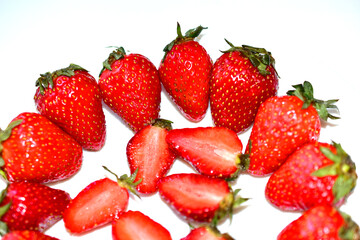 Cut strawberries or Victoria slices close up