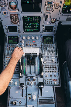 Pilots working in cockpit during flight