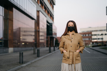 young woman in a protective mask 