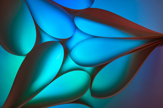 Abstract multicolored green and blue background with glowing bubbles of different shapes and colors - Powered by Adobe