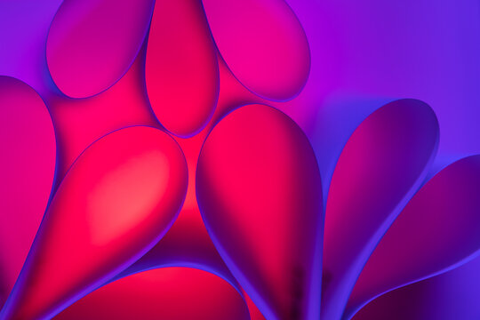 Abstract pink and purple background with glowing bubbles of different shapes and colors
