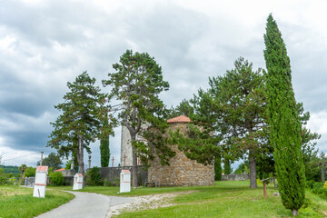 Old catholic church on a background of blue sky with clouds
