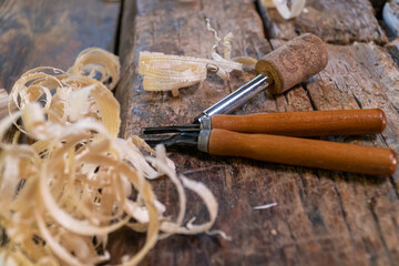 Joiner tools on an old workbench. Traces of wood processing.