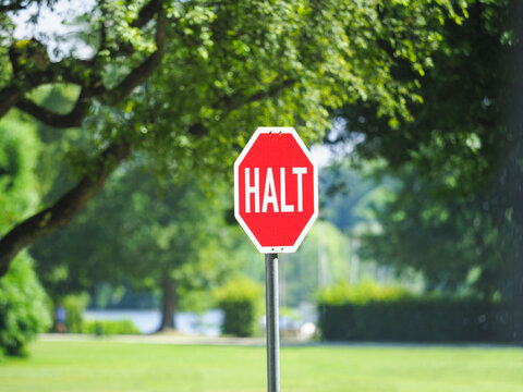 Halt or stop road sign in German