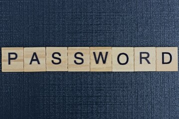 text on word password from gray wooden letters on a black background
