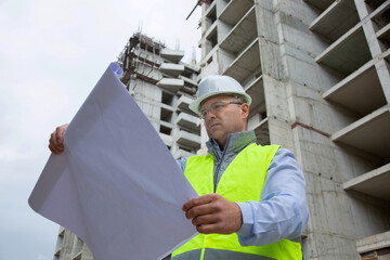 Engineer Working on Building Site