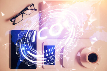 Double exposure of blockchain theme hologram over table with phone. Top view. Crypto technology...