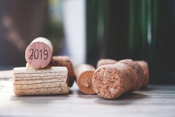 wine cork 2019 vintage, wine corks on wooden table