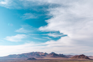 clouds over the mountains blue sky