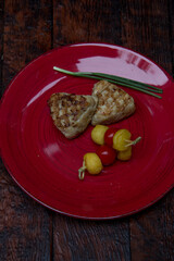 meat cutlets with vegetables close-up on a decorative background. Fried meat, meat dish