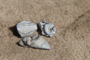 Fototapeta na wymiar antique deformed lead bullet after firing