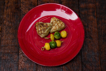meat cutlets with vegetables close-up on a decorative background. Fried meat, meat dish